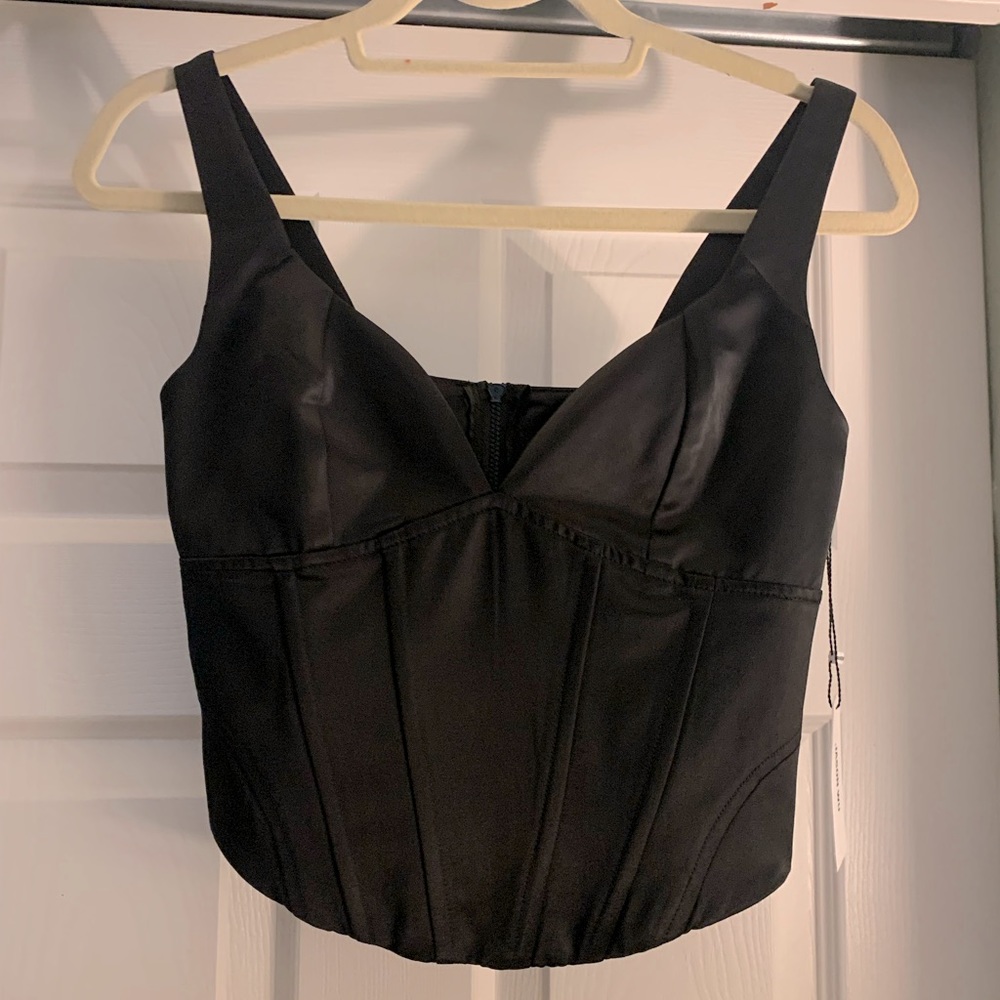 NEW Corset style silky material with zip up back.